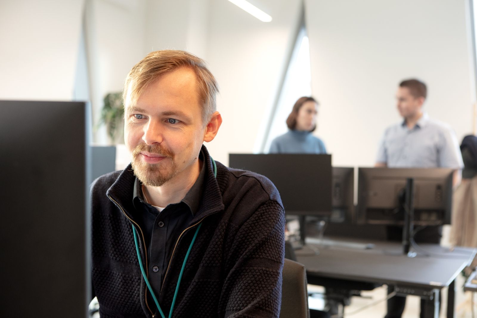 Prenaital team member at a workstation in the office